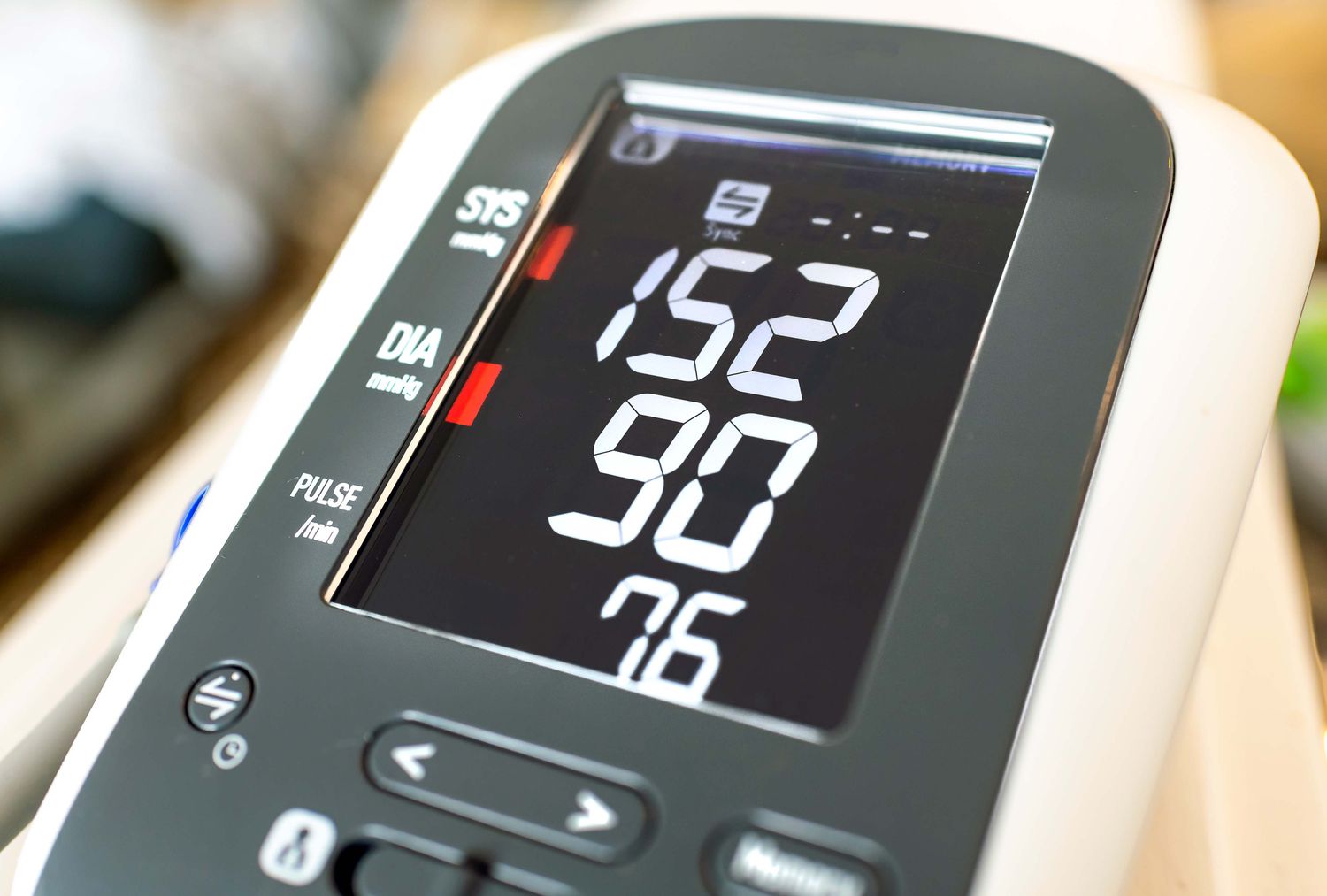 Close-up of the Dexcom Stelo continuous glucose monitor sensor and application interface.