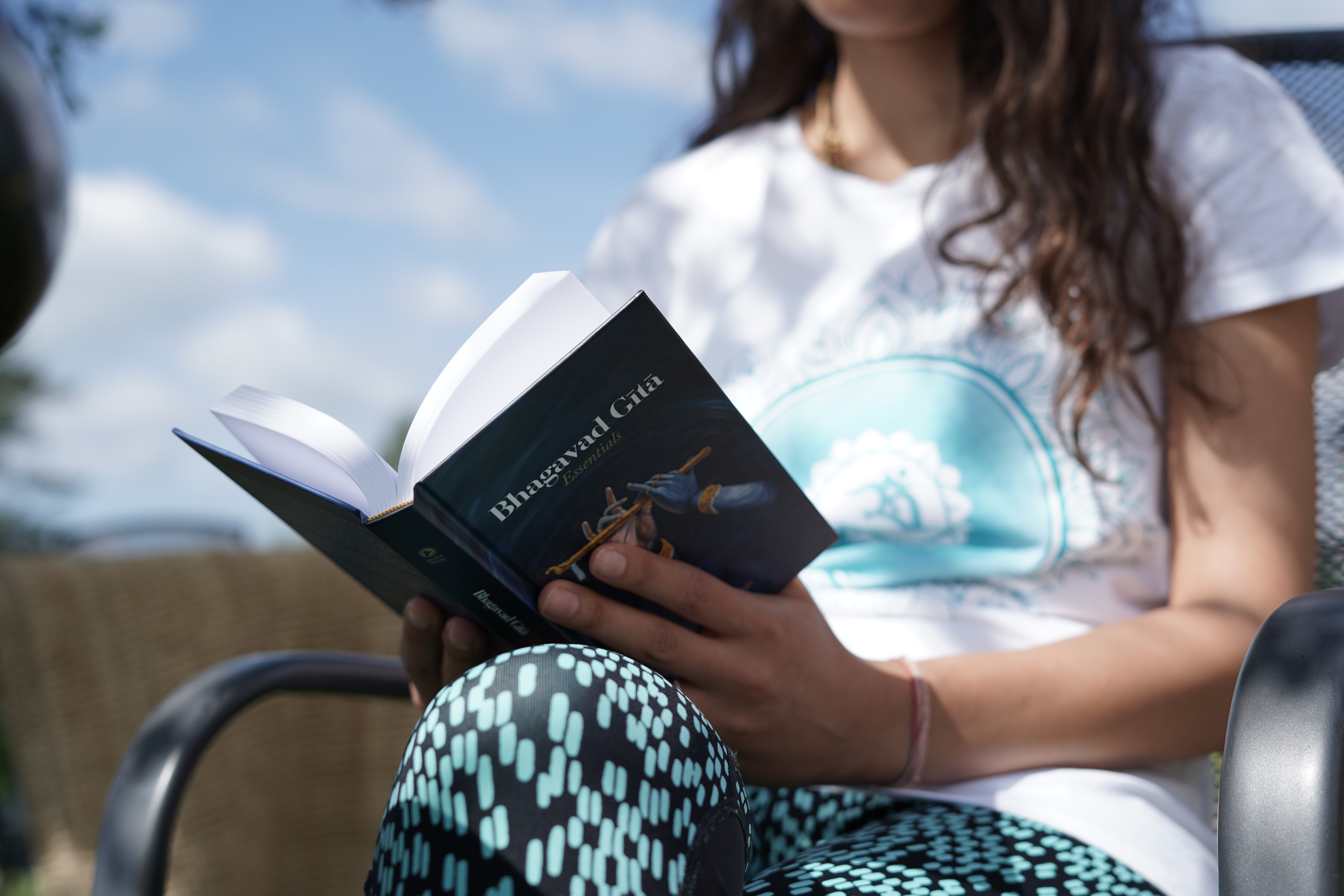 A spiritual practitioner engaged in Shravana-bhakti, listening to sacred teachings.