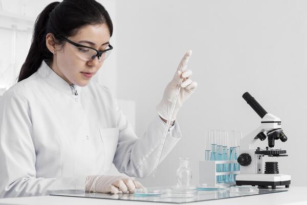 A scientist in a lab setting conducting research on Ozempic and gastrointestinal motility.