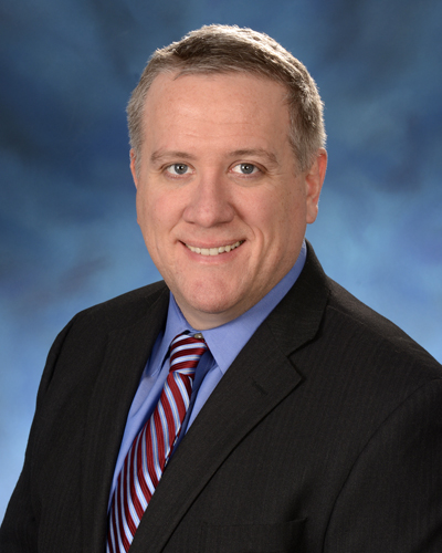 Professional portrait of sleep medicine researcher Emerson M. Wickwire, PhD.