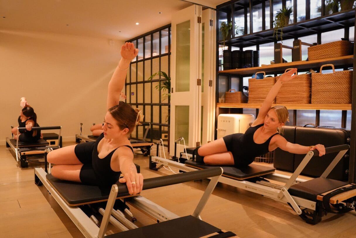 An intimate boutique Pilates studio space at Bodyism Notting Hill with four reformer beds.
