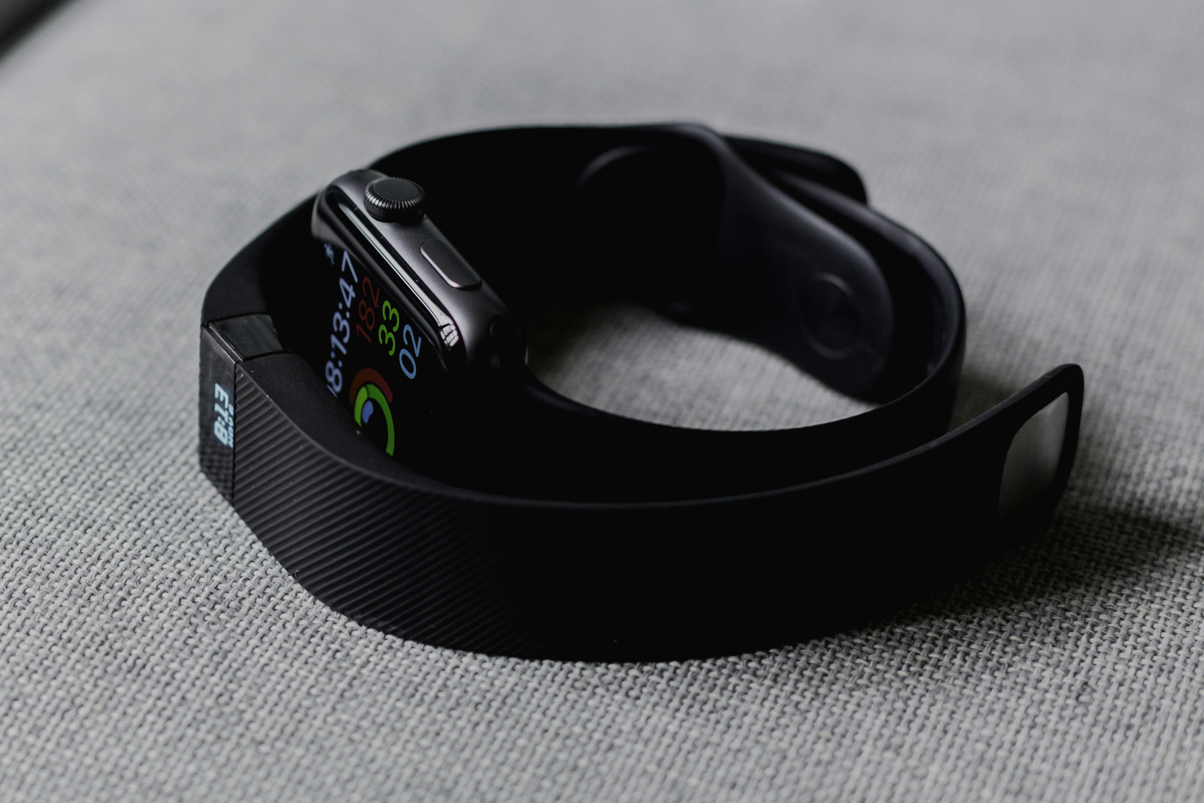 A smartphone displaying a fitness app with calorie tracking and workout data.