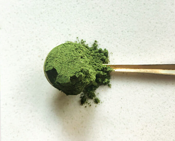Text overlay stating that the most affordable green powder is a favorite.