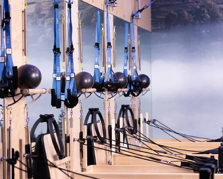 Close-up of high-quality Pilates Reformer equipment in a studio setting.