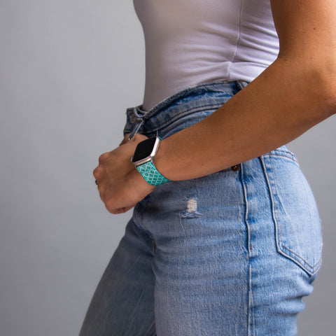 A close-up shot of a clean and comfortable Apple Watch band on a wrist.