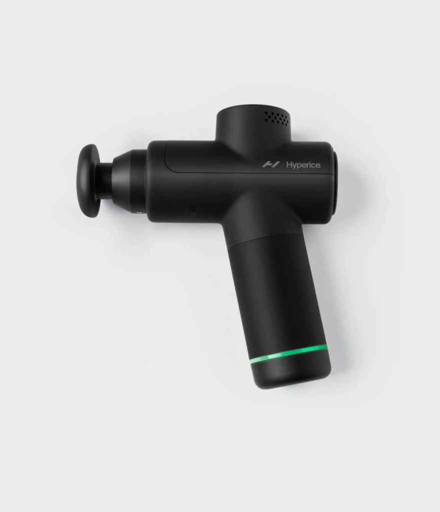 A handheld Hypervolt Go 2 massage gun used for muscle recovery.