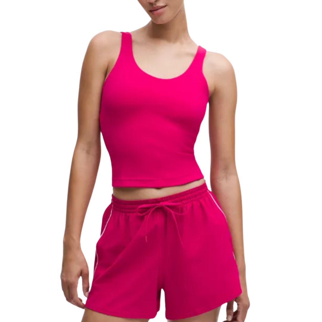 A supportive fitness tank top suitable for low-impact Pilates movements.