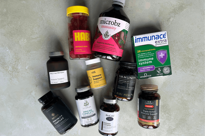 A group of different children's immune support supplement bottles arranged for comparison testing.